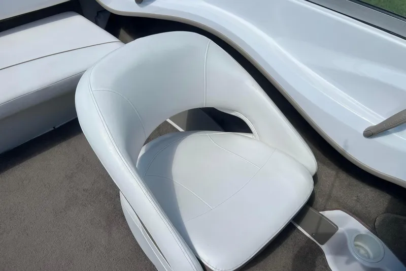 Slide: The Image of White leather seat in 2008 Four Winns H190 boat interior. - 44