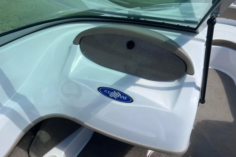 Slide: The Image of 2008 Four Winns H190 boat interior with logo and windshield detail. - 46