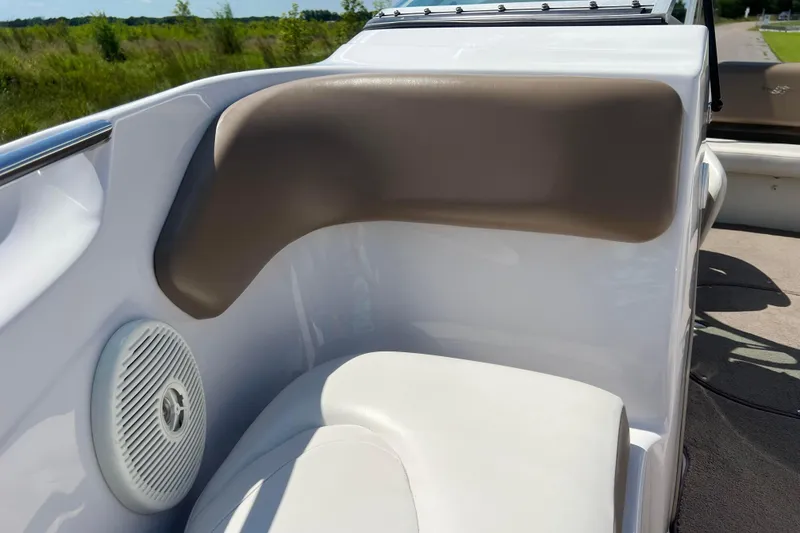 Slide: The Image of 2008 Four Winns H190 boat interior with speaker and cushioned seating. - 60