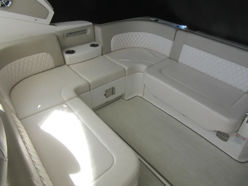 Slide: The Image of 2017 Chaparral 330 Signature boat propellers in a maintenance facility. - 10