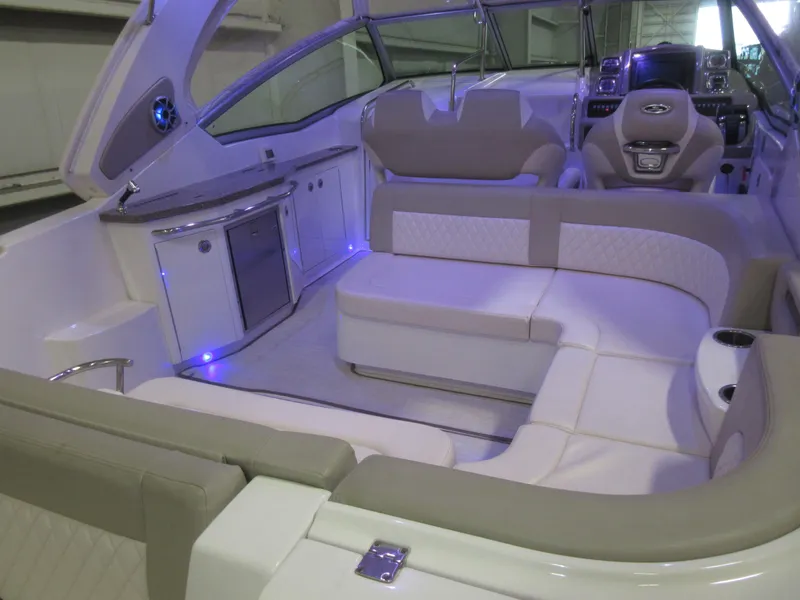 Slide: The Image of 2017 Chaparral 330 Signature boat seat with cup holders and quilted backrest. - 13