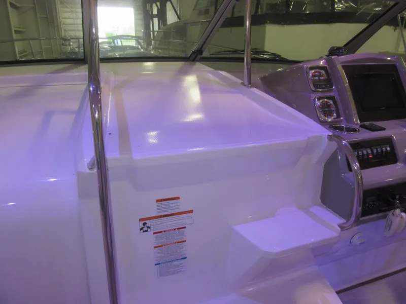 Slide: The Image of 2017 Chaparral 330 Signature boat interior with sleek design and modern features. - 19