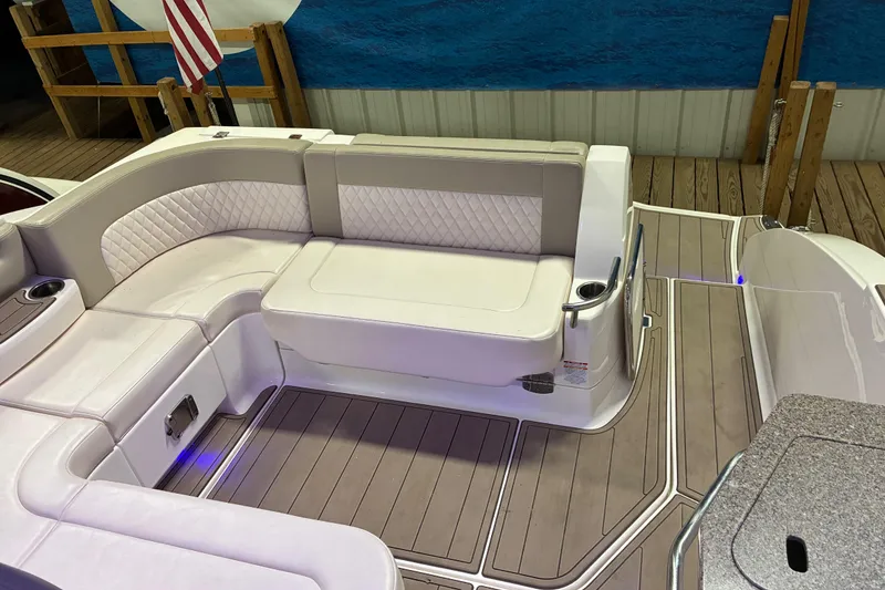 Slide: The Image of Luxurious interior of 2017 Chaparral 330 Signature boat with elegant seating and modern amenities. - 32