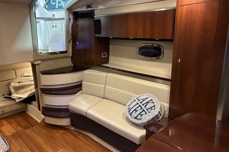 Slide: The Image of Luxurious interior of 2017 Chaparral 330 Signature yacht with elegant seating and wooden flooring. - 43