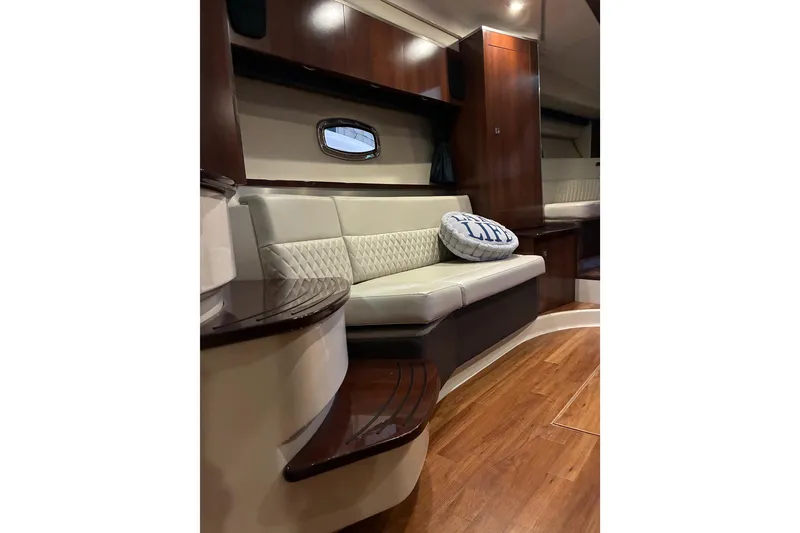 Slide: The Image of Luxurious interior of 2017 Chaparral 330 Signature yacht with elegant seating and wood finish. - 49