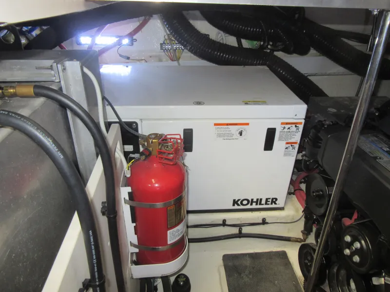 Slide: The Image of Engine room of 2017 Chaparral 330 Signature with dual inboard motors. - 6