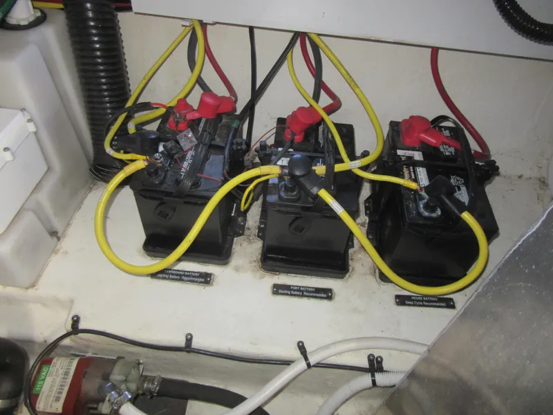 Slide: The Image of Engine room of 2017 Chaparral 330 Signature with Kohler generator and fire extinguisher. - 7