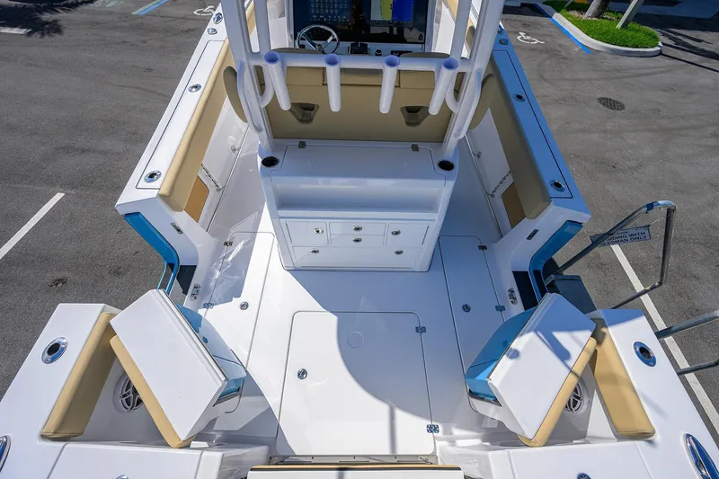 Slide: The Image of 2026 Sportsman Open 302 Center Console boat interior with seating and storage compartments. - 14