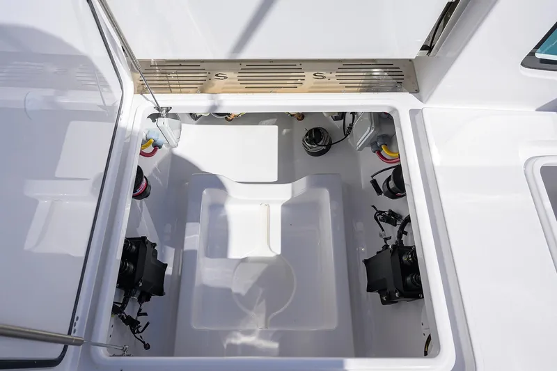 Slide: The Image of 2026 Sportsman Open 302 Center Console boat interior compartment view. - 20