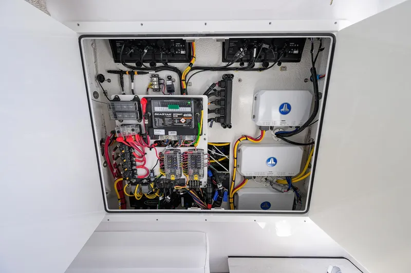 Slide: The Image of Electrical system of 2026 Sportsman Open 302 Center Console boat, showcasing wiring and components. - 36