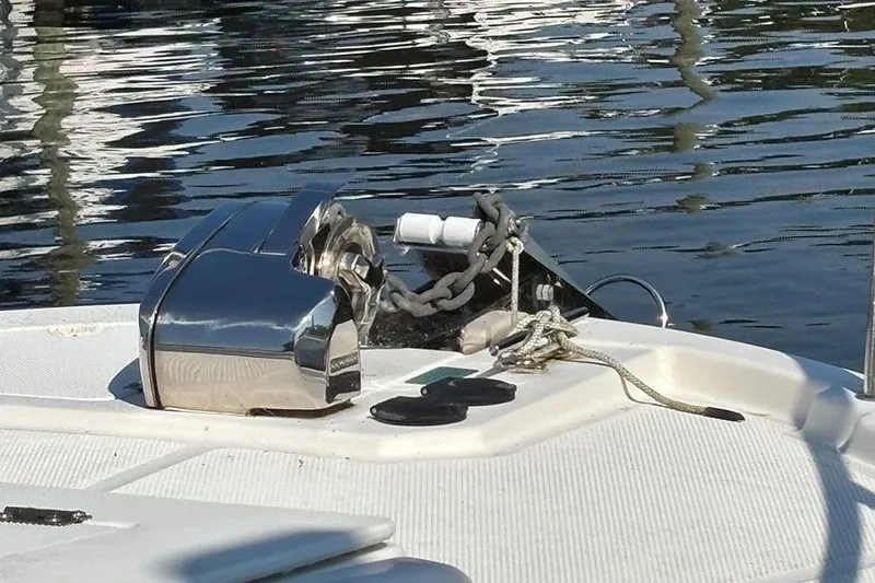 Slide: The Image of 2021 Ranger Tugs R-27 boat anchor system on calm water. - 5