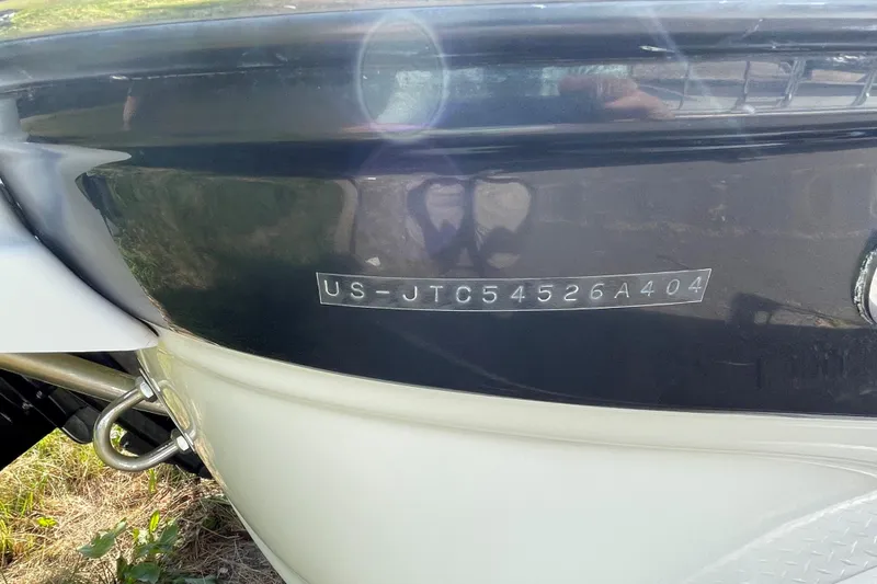 Slide: The Image of 2004 Crownline 216 LS boat with visible hull identification number. - 8