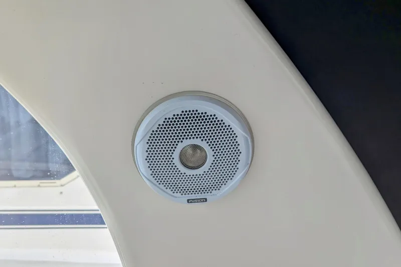 Slide: The Image of Speaker installed on 2004 Sea Ray 340 Sundancer boat, featuring Fusion audio system. - 14