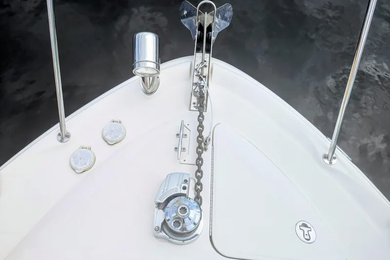 Slide: The Image of Bow of 2004 Sea Ray 340 Sundancer with anchor and chain detail. - 30