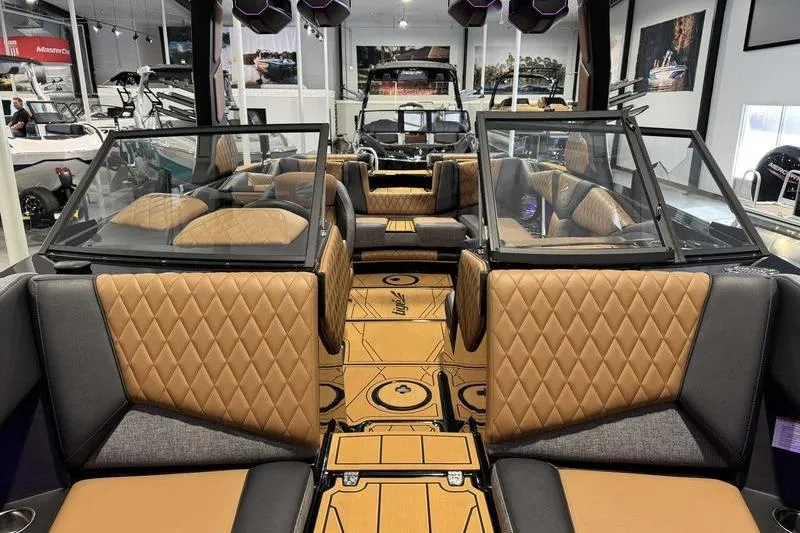 Slide: The Image of Luxurious interior of 2026 Tigé Z3 boat with diamond-stitched seats and modern design. - 12