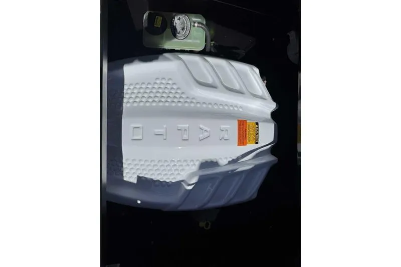 Slide: The Image of 2026 Tigé Z3 boat rear view with teak deck and stylish seating. - 2