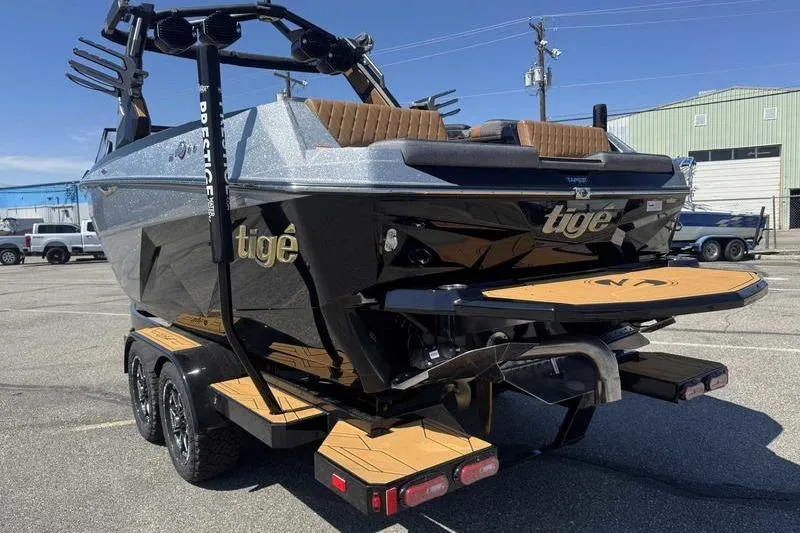 Slide: The Image of 2026 Tigé Z3 boat on trailer in parking lot, front view. - 4