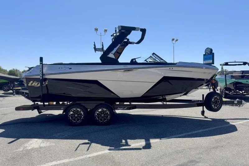 Slide: The Image of 2026 Tigé Z3 boat on trailer, featuring sleek design and modern finishes. - 5