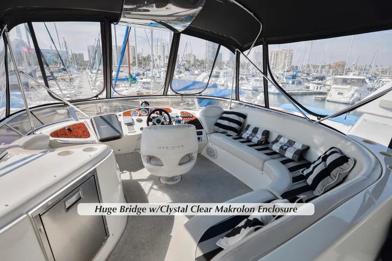 Slide: The Image of 2005 Meridian 459 Aft Cabin Motor Yacht with spacious bridge and clear enclosure. - 10