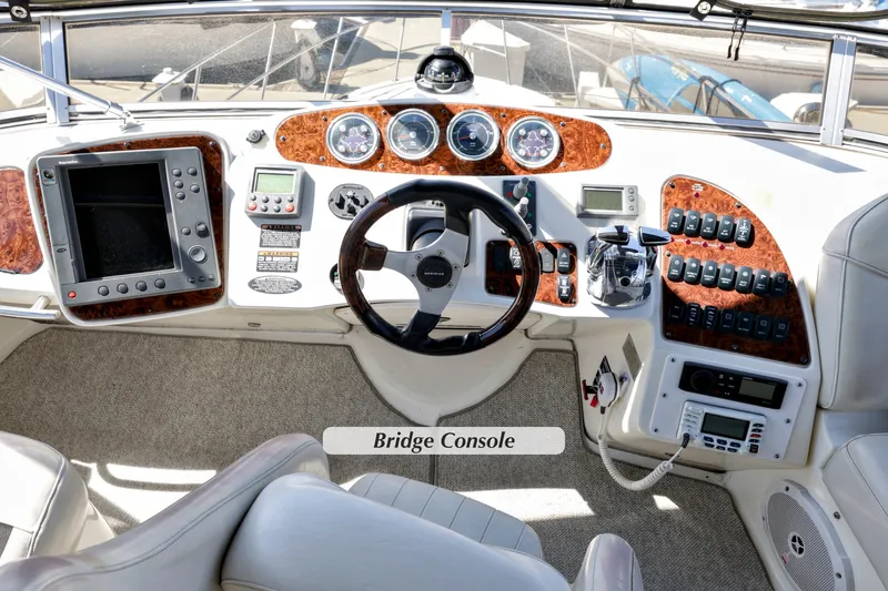 Slide: The Image of Bridge console of 2005 Meridian 459 Aft Cabin Motor Yacht with navigation instruments. - 11