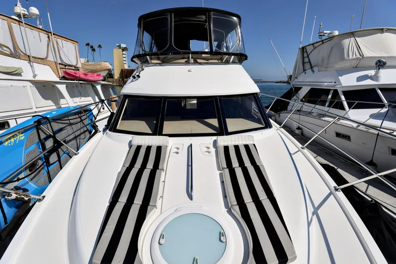 Slide: The Image of 2005 Meridian 459 Aft Cabin Motor Yacht docked at marina, sunny day. - 15