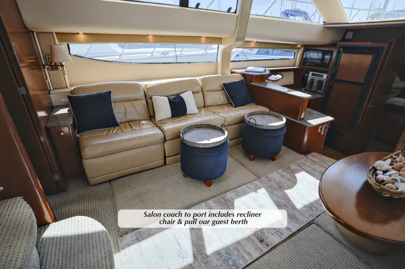 Slide: The Image of Luxurious salon interior of 2005 Meridian 459 Aft Cabin Motor Yacht with leather couch. - 17