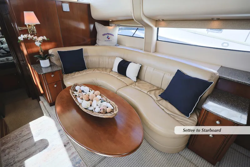 Slide: The Image of Luxurious interior of 2005 Meridian 459 yacht with elegant leather seating and decorative accents. - 18