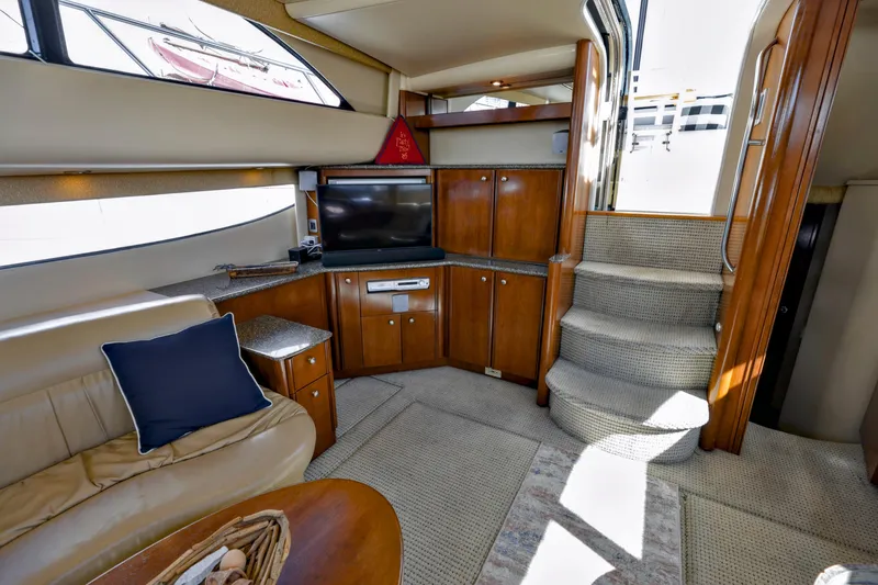 Slide: The Image of Luxurious interior of 2005 Meridian 459 Aft Cabin Motor Yacht with elegant wood cabinetry. - 19