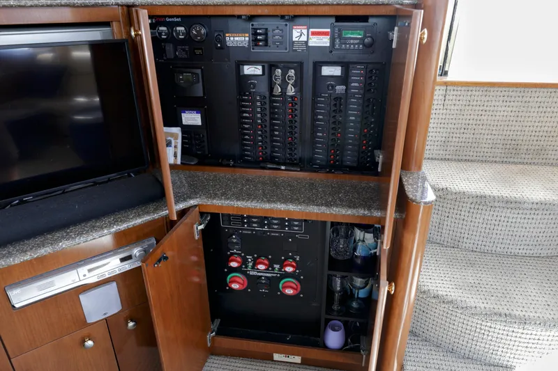 Slide: The Image of Electrical panel and entertainment system in 2005 Meridian 459 Aft cabin motor yacht. - 20