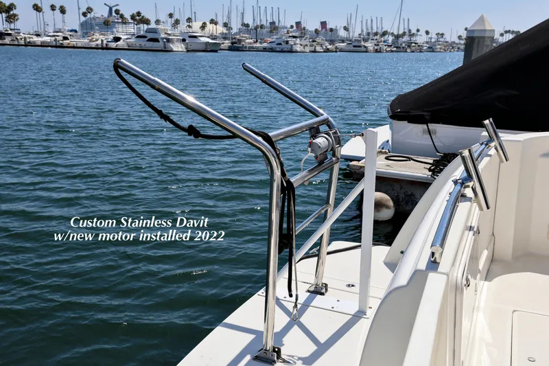 Slide: The Image of 2005 Meridian 459 Aft Cabin Yacht with custom stainless davit, new motor installed 2022. - 5