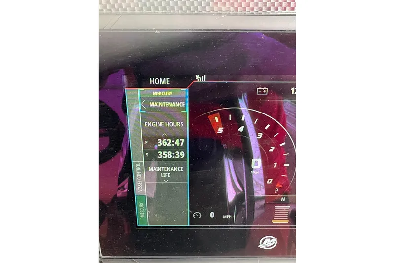 Slide: The Image of Engine room of 2017 Cruisers Yachts 39 Express Coupe, featuring equipment and machinery. - 40