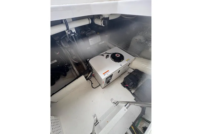 Slide: The Image of 2017 Cruisers Yachts 39 Express Coupe docked on a cloudy day. - 45