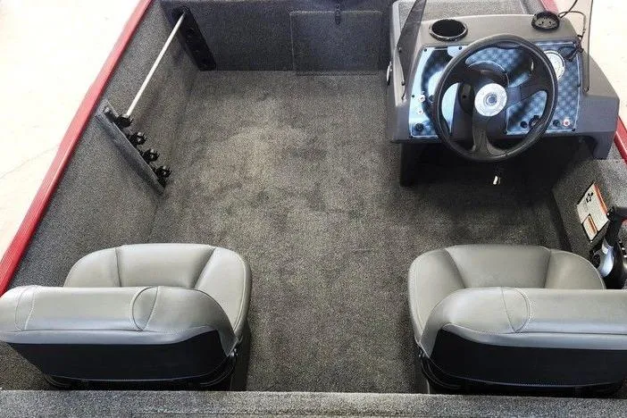 Slide: The Image of 2026 Tracker BASS TRACKER® Classic XL boat interior with dual seats and steering console. - 12