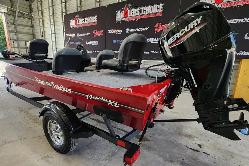 Slide: The Image of 2026 Tracker BASS TRACKER® Classic XL boat with Mercury engine in showroom. - 3