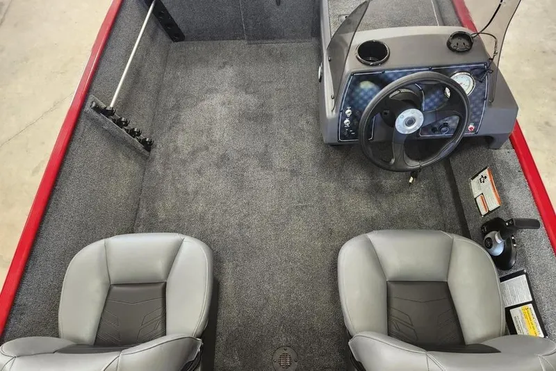 Slide: The Image of 2026 Tracker BASS TRACKER® Classic XL boat interior with steering console and two seats. - 6