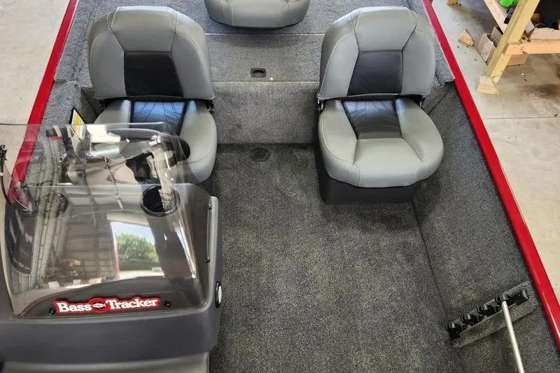 Slide: The Image of 2026 Tracker BASS TRACKER® Classic XL boat interior with gray seats and console. - 9