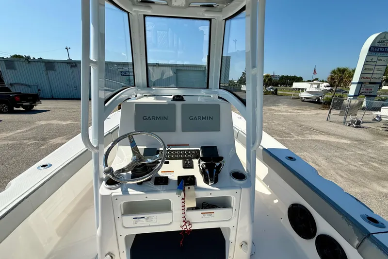 Slide: The Image of 2022 Blue Wave 2800 Makaira boat console with Garmin navigation system. - 14