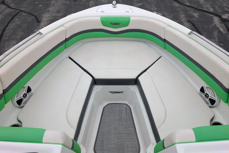 Slide: The Image of 2018 Chaparral Vortex 203 VRX boat interior with green and white seating. - 12