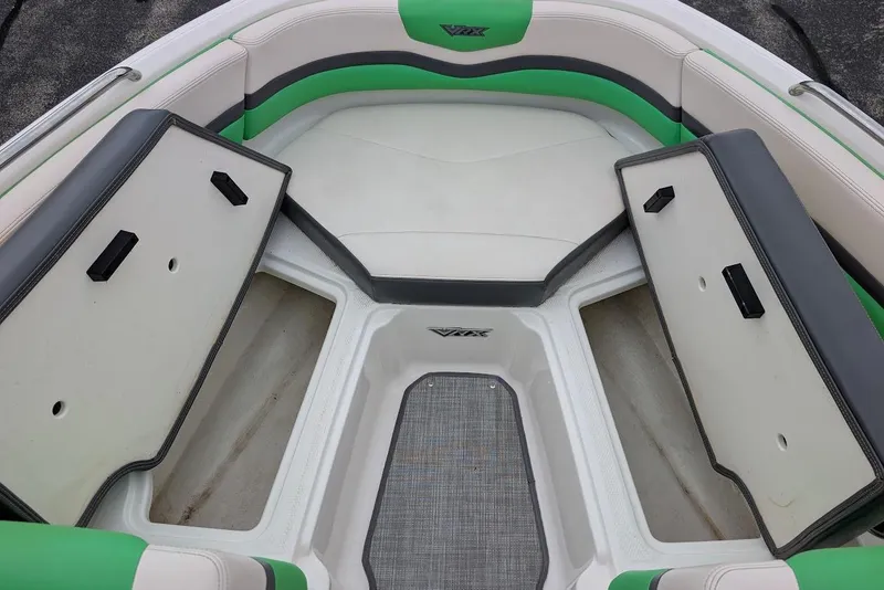 Slide: The Image of 2018 Chaparral Vortex 203 VRX boat interior with open storage compartments. - 13