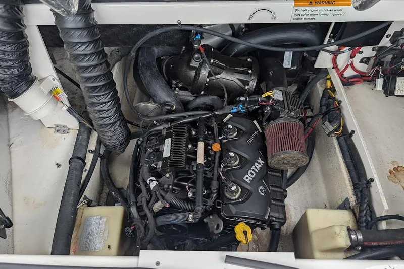 Slide: The Image of Engine compartment of 2018 Chaparral Vortex 203 VRX with Rotax engine components. - 29