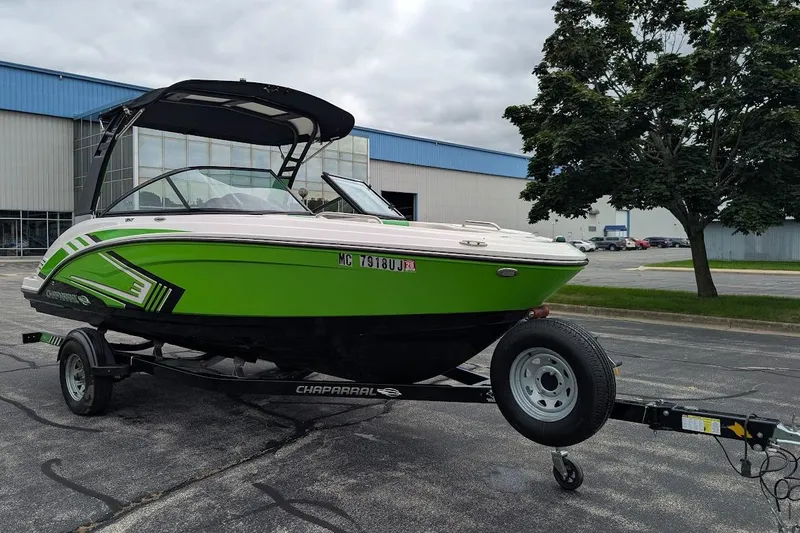 Slide: The Image of 2018 Chaparral Vortex 203 VRX boat in vibrant green on a trailer. - 3