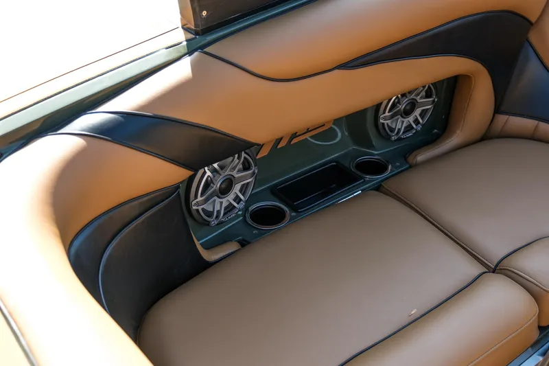Slide: The Image of 2022 MB B52 23 Alpha interior with tan leather seats and built-in speakers. - 14