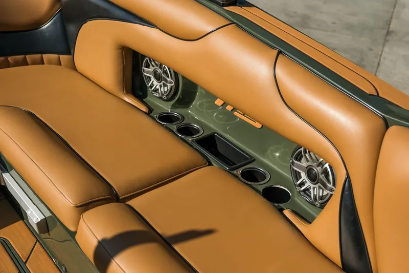 Slide: The Image of Luxurious tan leather seating in 2022 MB B52 23 Alpha boat interior with speakers. - 15