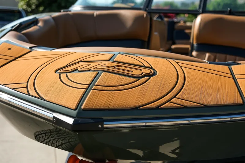 Slide: The Image of 2022 MB B52 23 Alpha boat with stylish wood-patterned deck and luxurious seating. - 23