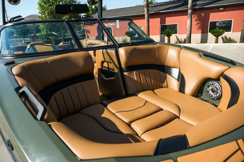 Slide: The Image of Luxurious interior of 2022 MB B52 23 Alpha boat with tan leather seating. - 5