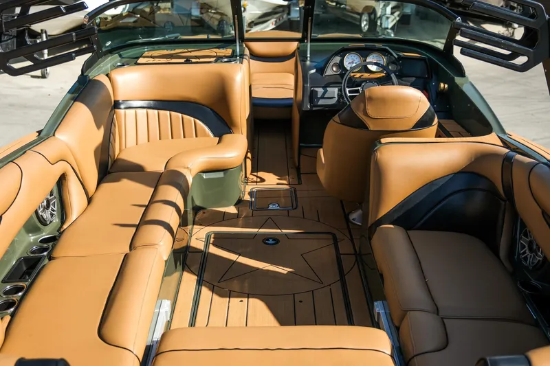 Slide: The Image of Luxurious interior of 2022 MB B52 23 Alpha boat with tan leather seating. - 8