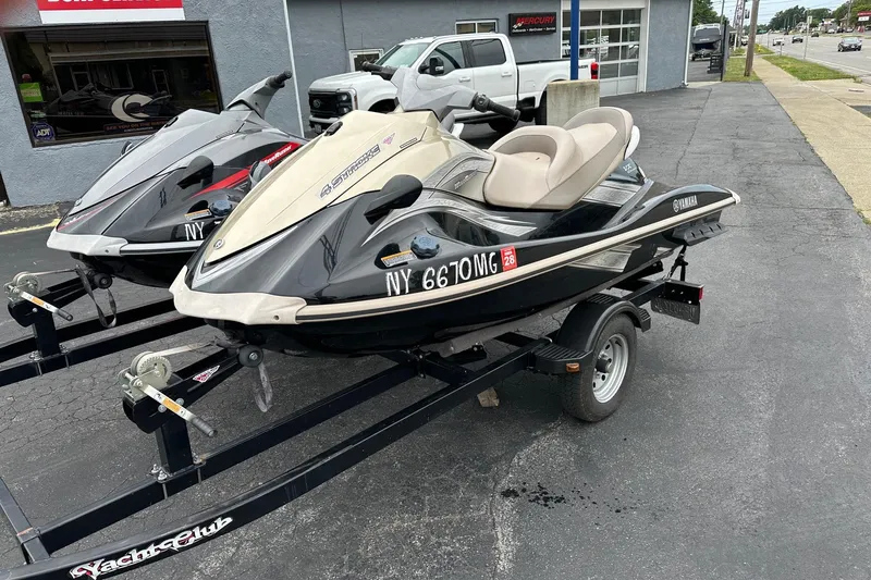 Slide: The Image of 2009 Yamaha WaveRunner VX Cruiser on trailer, parked outside dealership. - 2