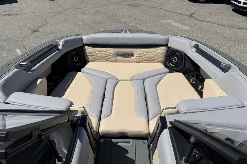 Slide: The Image of Luxurious interior of 2026 Supra SA boat with beige and gray seating. - 11