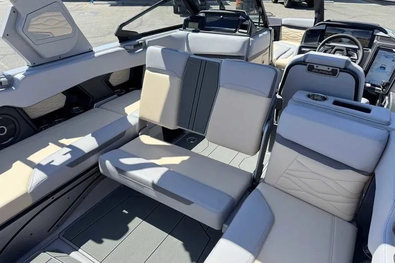 Slide: The Image of 2026 Supra SA boat interior with modern seating and dashboard design. - 13