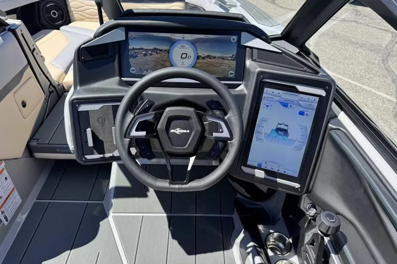 Slide: The Image of 2026 Supra SA boat dashboard with advanced digital displays and modern steering wheel. - 15